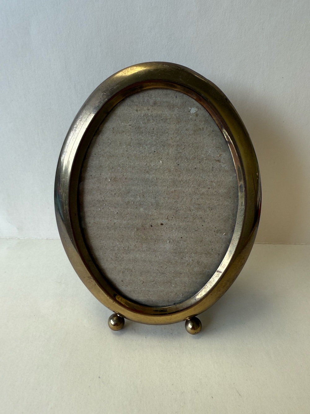 Vintage Small Oval Brass Picture Frame Ball Feet.